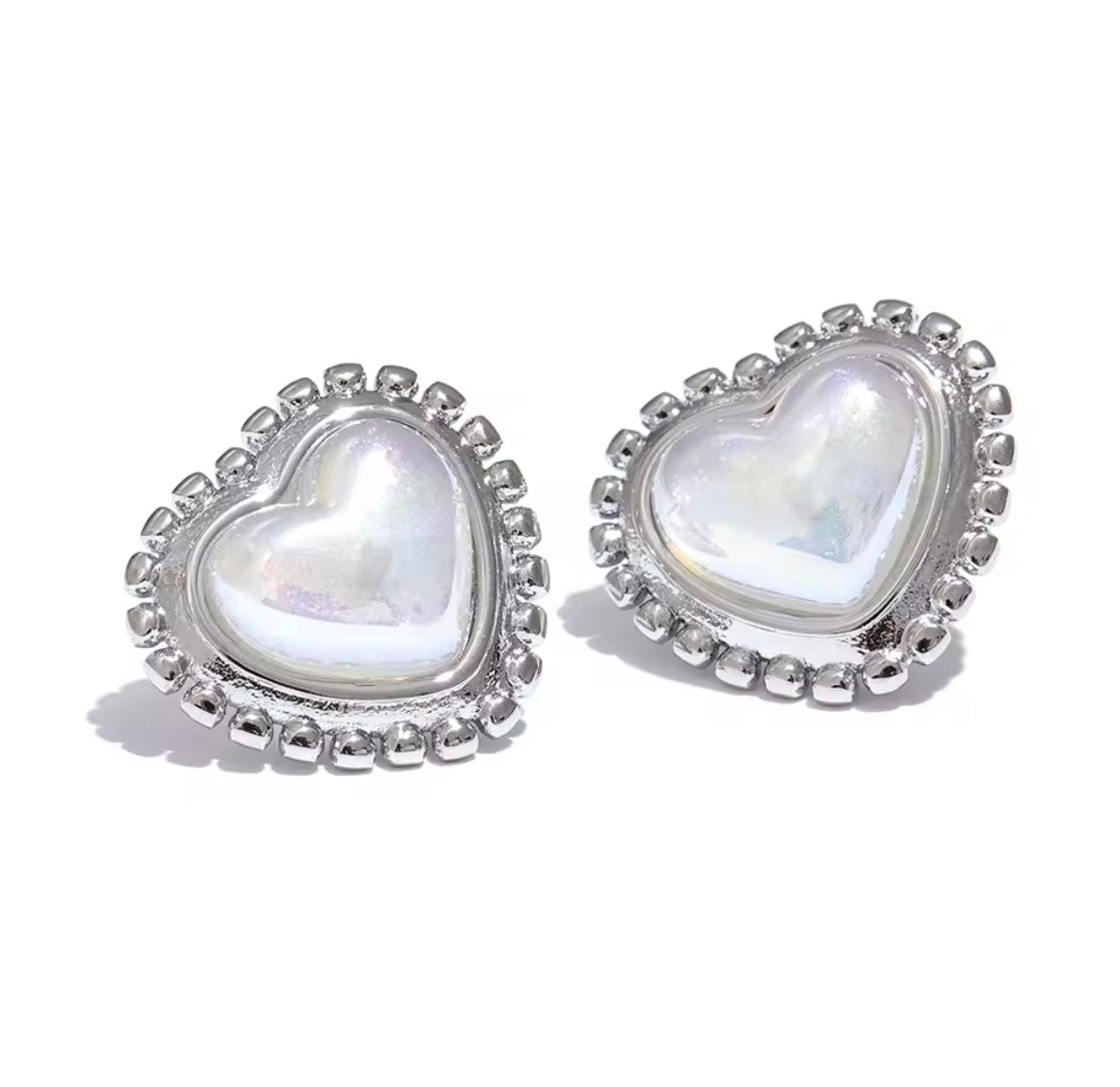 Aretes corazón tornasol